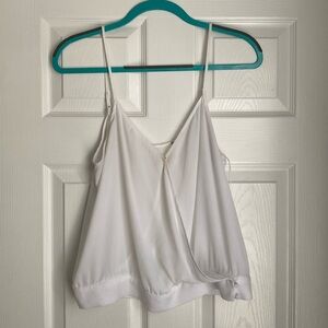 White cross snap front tank top